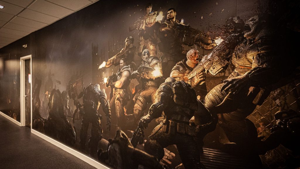 A mural art featuring delta squad and other cog soldier combating the locust horde