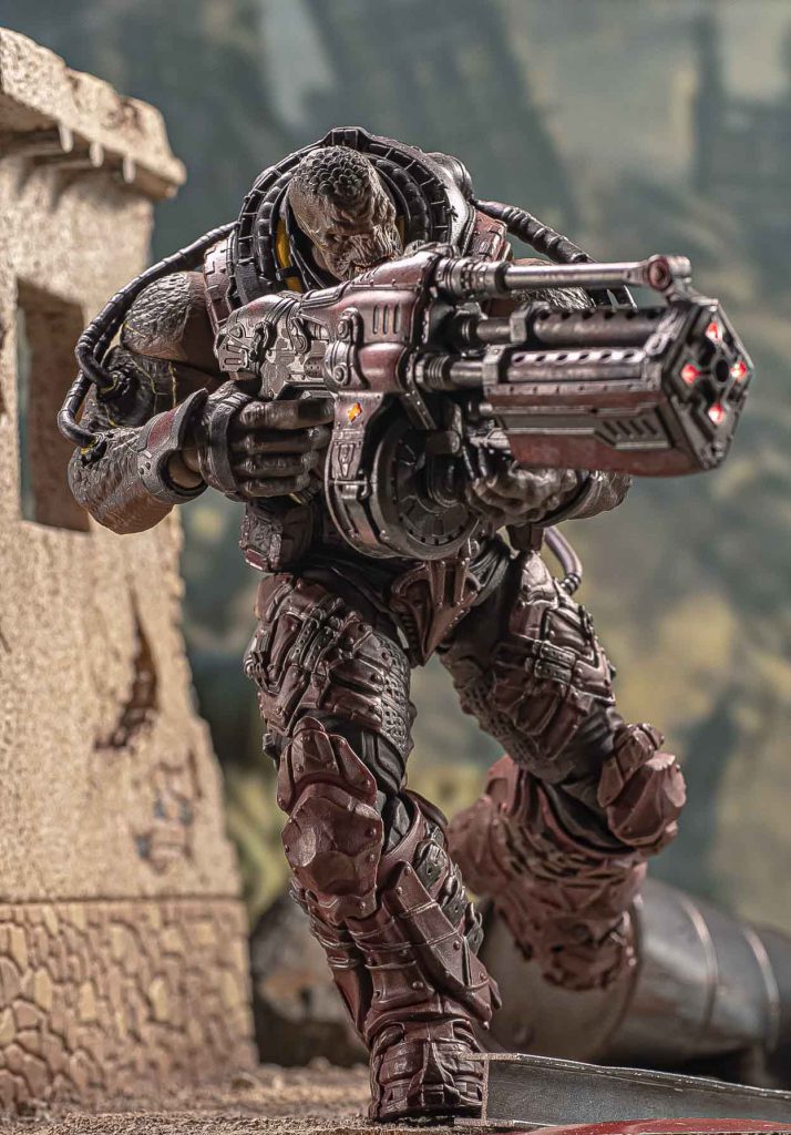 The Locust Disciple 1/12 scale action figure in an active battle-pose