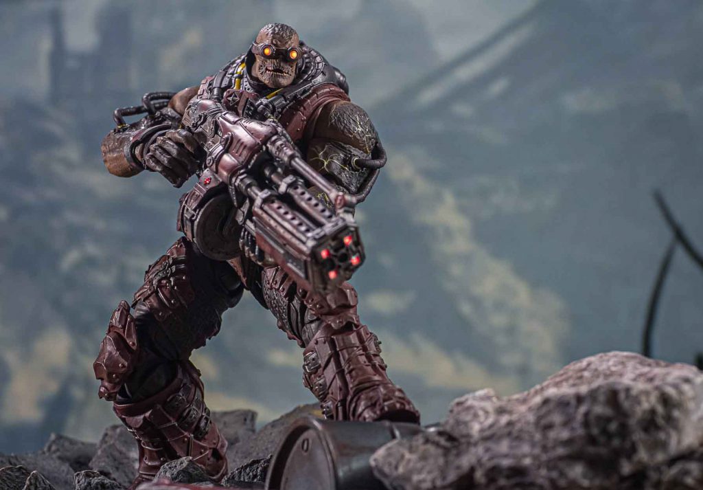 The Locust Disciple 1/12 scale action figure in an active battle-pose