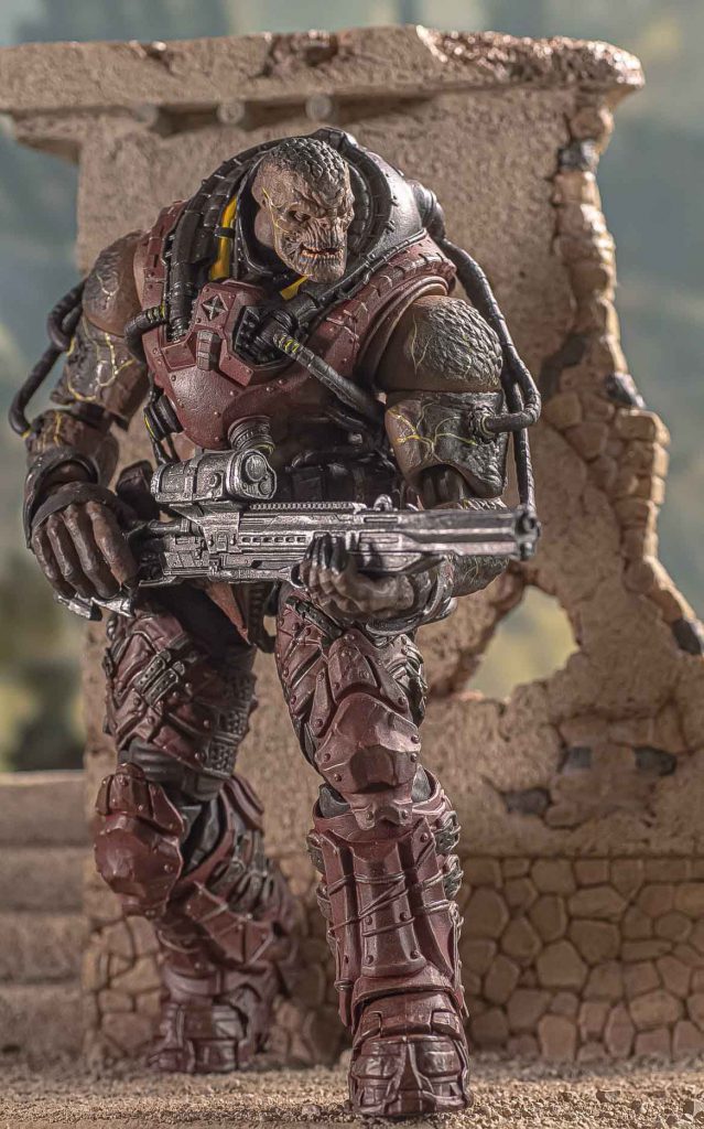 The Locust Disciple 1/12 scale action figure in an active battle-pose