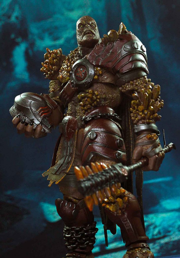 The Warden 1/12 scale action figure in an action pose
