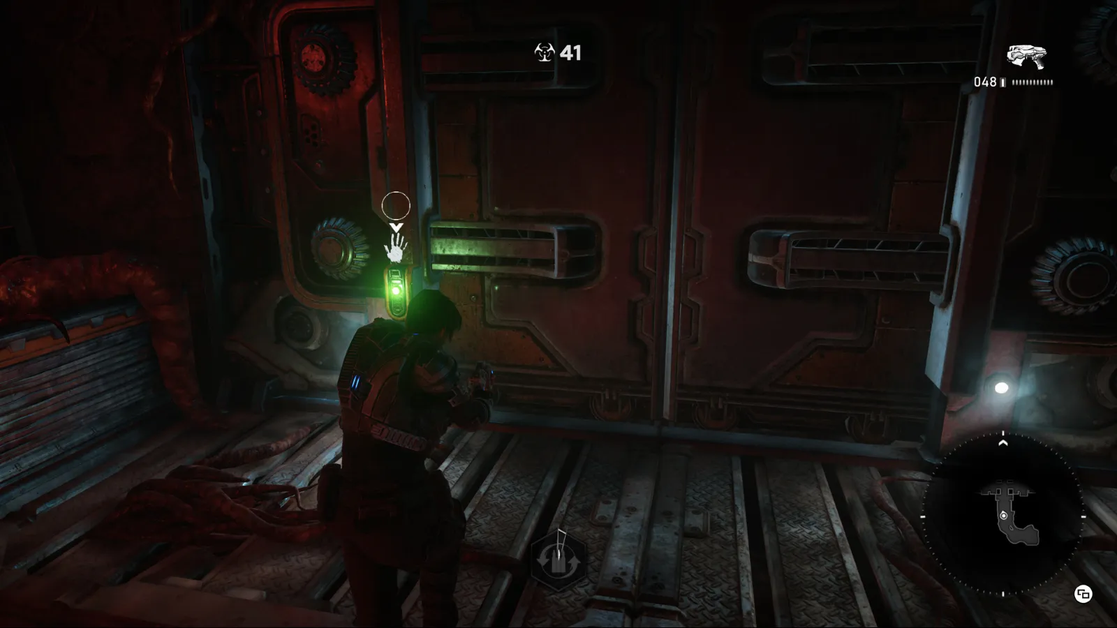 Gameplay of Kait about to go through some big iron doors