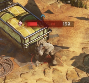 A downed enemy character hiding in cover waiting for someone to revive it