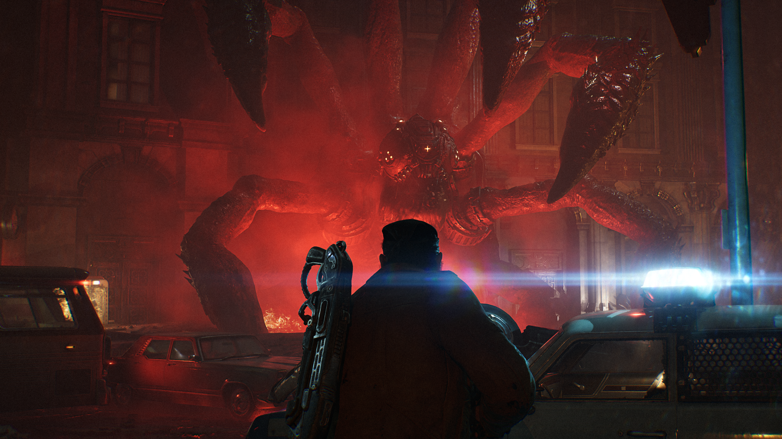Giant monster emerging in red light