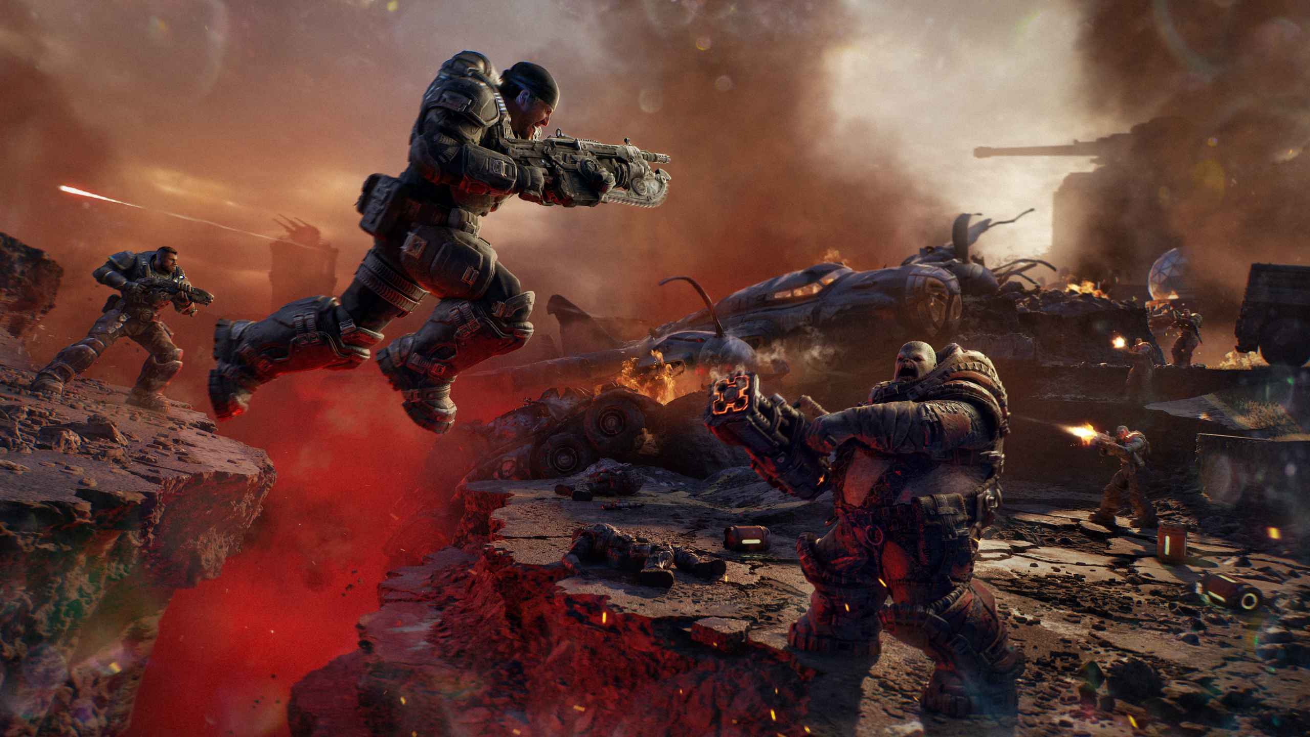 Marcus Fenix leaps over glowing red gorge to face an enemy boomer below